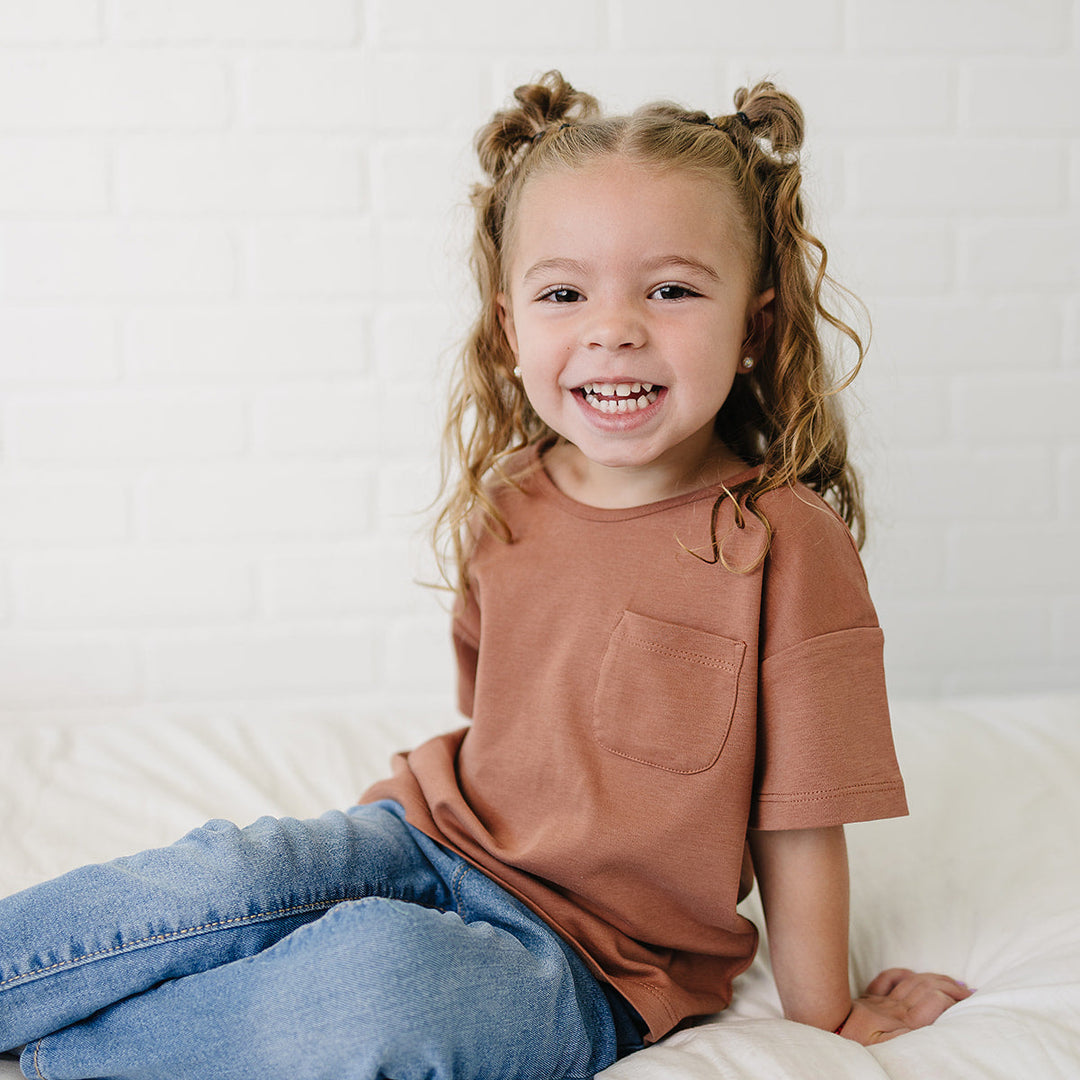 Toddler wearing Our Little Treasures organic cotton t-shirt in Chestnut